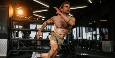 Athlete performing an intense workout, pushing towards visible fitness progress.