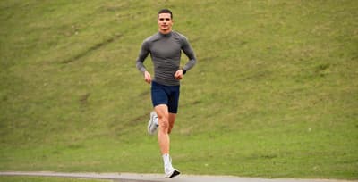 athlete-running-outside-gut-health-performance.jpg