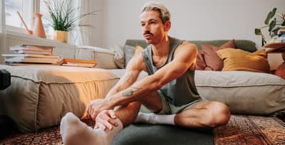 Athlete struggling and exhausted during a workout, illustrating the effects of poor diet on performance