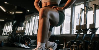 Athlete performing lunges to build leg strength and support knee health