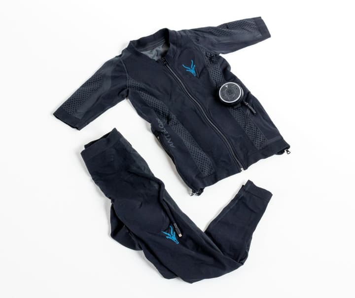 Antelope Evolution EMS suit jacket and pants laid flat, with the control unit that delivers electrical muscle stimulation