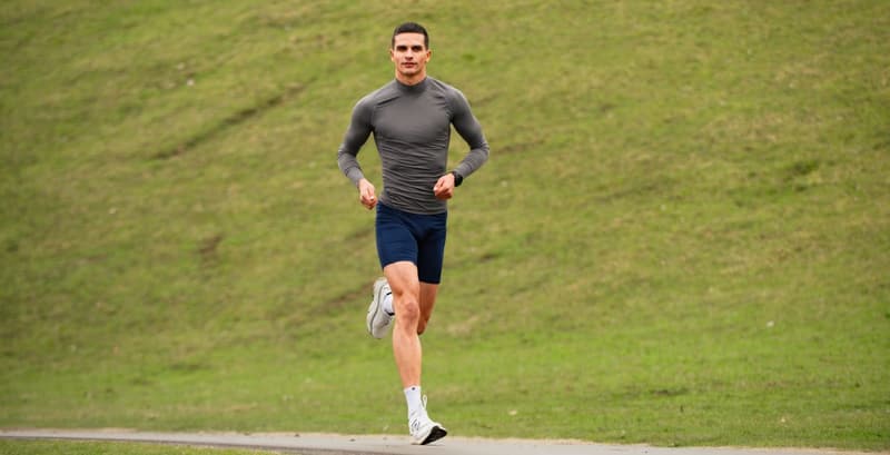 athlete-running-outside-gut-health-performance.jpg