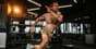 Athlete performing an intense workout, pushing towards visible fitness progress.