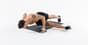 Athlete performing Cross-Body Pushups using pushup bars