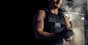 Athlete wearing a weighted vest during a workout, demonstrating the benefits of added resistance for strength and endurance training.